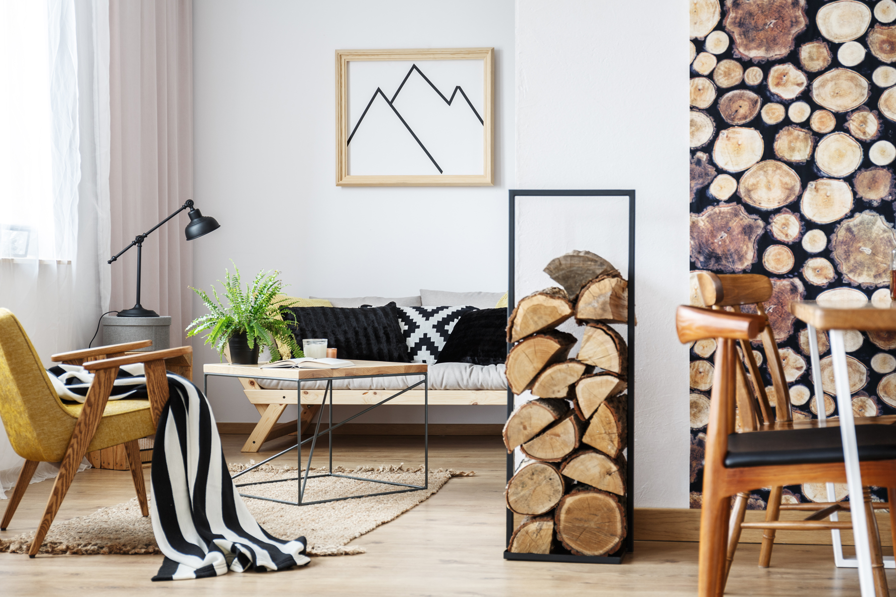 Cozy winter interior design Cozy winter interior design for minimalist with wooden accessories, warm colors and fire logs
